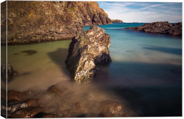 Rocky coastal scenery at Kynance Cove Canvas Print by Andrew Michael