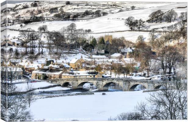 Burnsall In The Snow Canvas Print by Tom Holmes