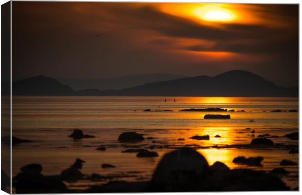 Paddleboarders enjoying the sunset Canvas Print by Chris Wright