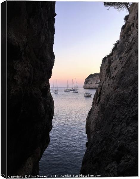 Boats at Sunset, Cala Galdana, Menorca Canvas Print by Ailsa Darragh