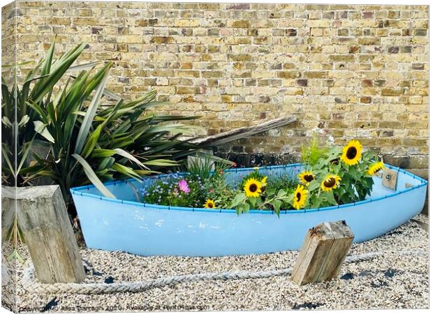 Burnham on Crouch Boat of Flowers Canvas Print by Ailsa Darragh