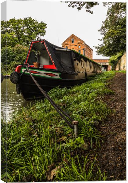 Moored narrowboat Canvas Print by Clive Wells