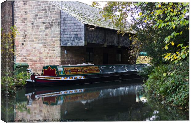 Narrow boat at Cromford Canvas Print by Clive Wells