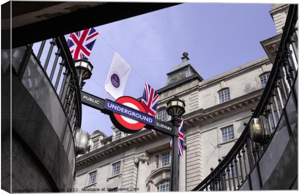 Bunting above the tube station Canvas Print by Clive Wells