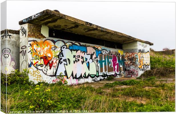 Graffiti on shelter above Folkstone in Kent Canvas Print by Clive Wells