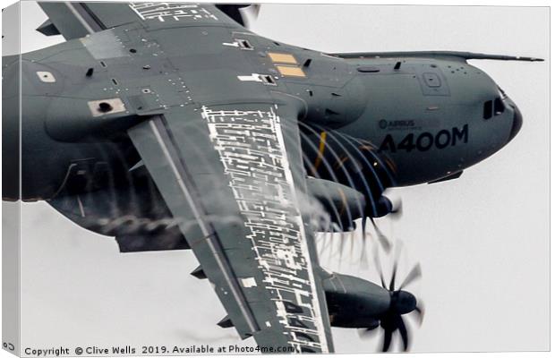 A400M Atlas pulling hard Canvas Print by Clive Wells