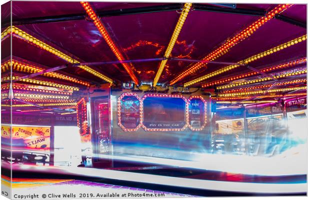 The Waltzer fairgrown ride at Kings Lynn, Norfolk Canvas Print by Clive Wells