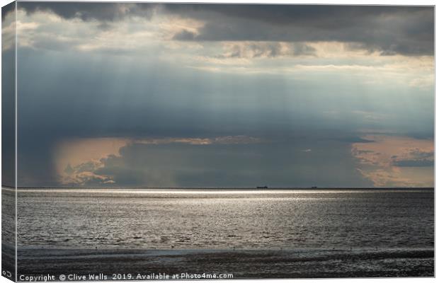 Bright skys over the sea at Hunstanton, Norfolk Canvas Print by Clive Wells