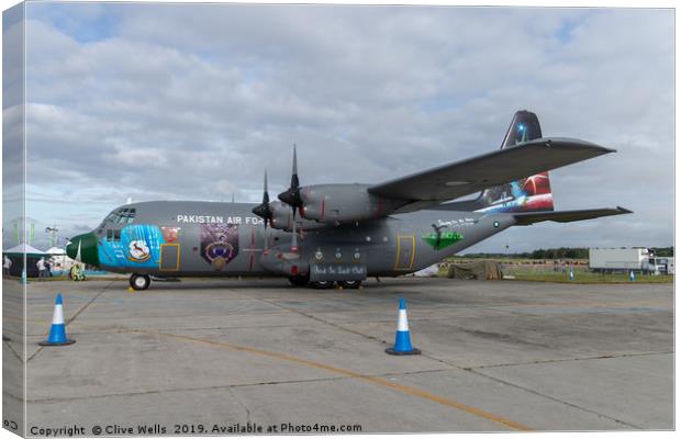 Lockheed C-130E Hercules at RAF Fairford Canvas Print by Clive Wells