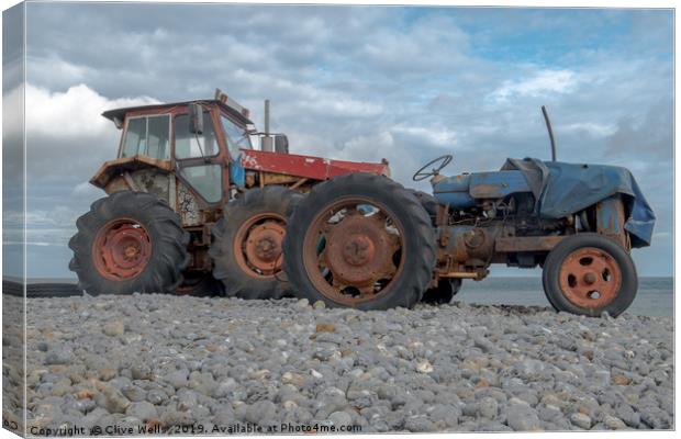 Tractors at Cromer in North Norfolk Canvas Print by Clive Wells