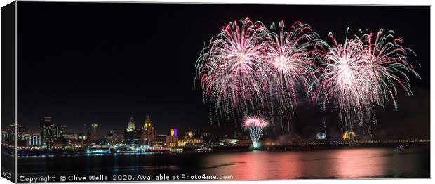 Fireworks over the waterfront at Liverpool Canvas Print by Clive Wells