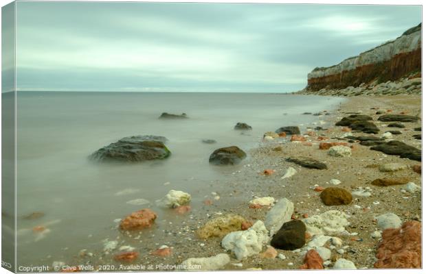 The striped cliffs at Old Hunstanton seen using lo Canvas Print by Clive Wells