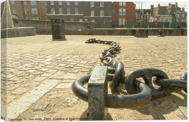 Chains on the old docks at Kings Lynn in Norfolk Canvas Print by Clive Wells