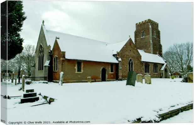 St. Faiths Church covered in snow Canvas Print by Clive Wells