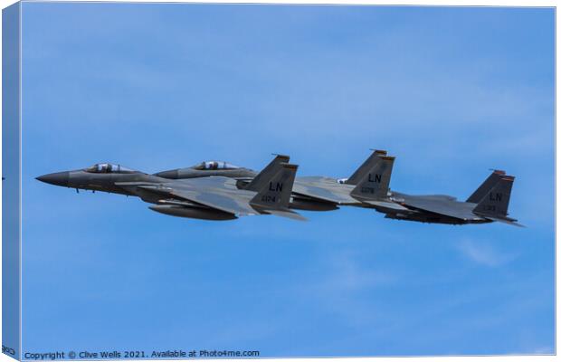 Three F-15`s overfly RAF Fairford Canvas Print by Clive Wells