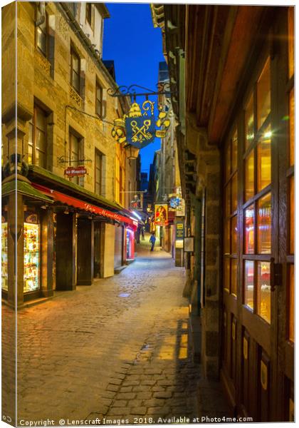 Looking up Grand Rue, Mont Saint Michel at night Canvas Print by Lenscraft Images