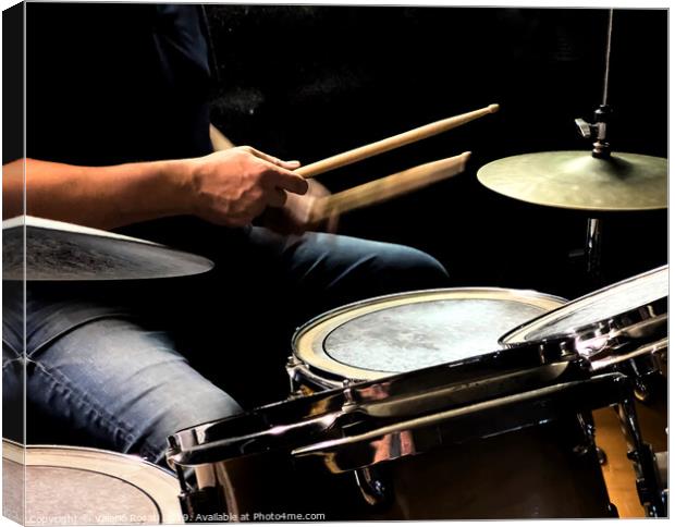 a drummer while playing the drums Canvas Print by Valerio Rosati