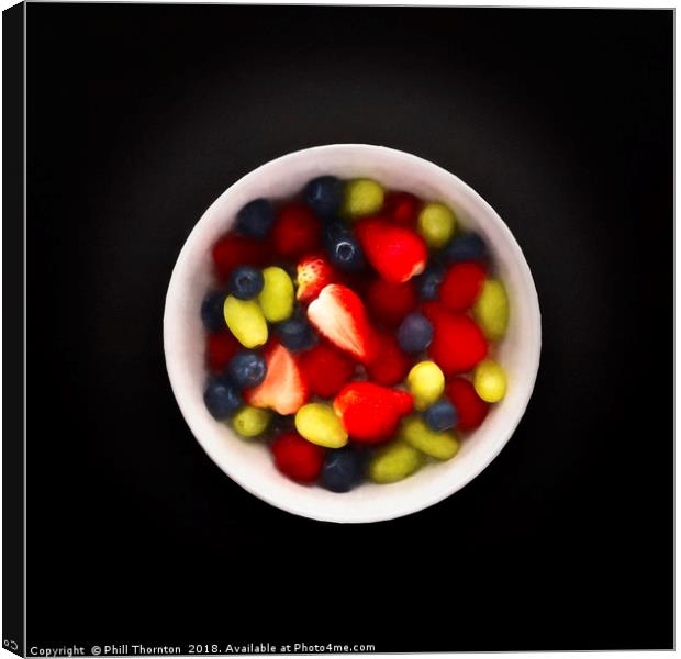Still life of a bowl of fresh fruit salad. Canvas Print by Phill Thornton