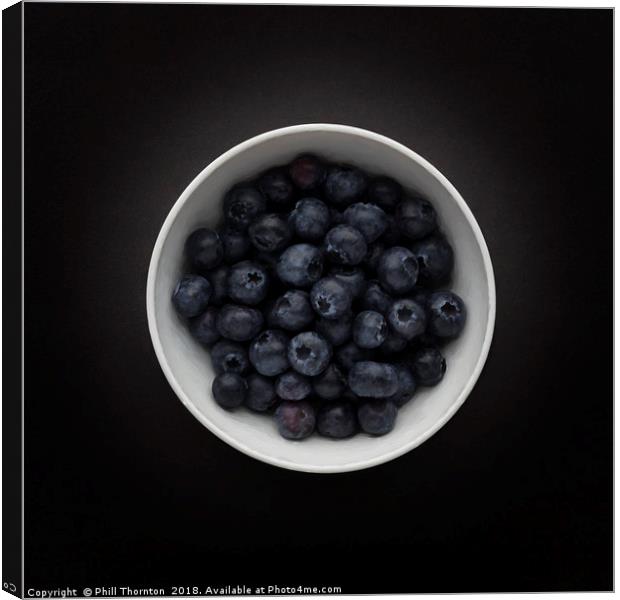 Still life of a bowl of Blueberries. Canvas Print by Phill Thornton