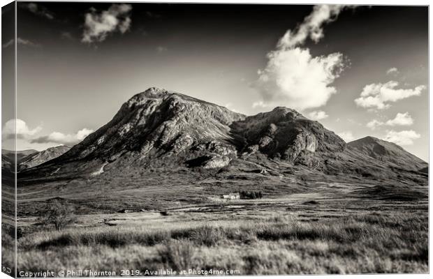 Dramatic skies over over Stob Dearg Canvas Print by Phill Thornton