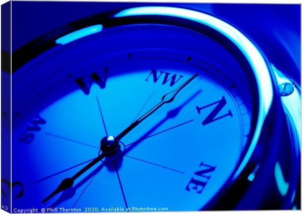 close up of a compass with a blue tone effect Canvas Print by Phill Thornton
