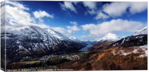 Loch Leven and the village of Kinlochleven. Canvas Print by Phill Thornton