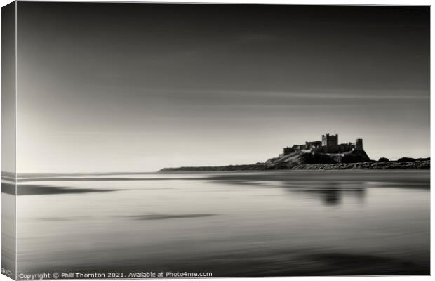 Sunrise over Bamburgh Castle No. 4 B&W. Canvas Print by Phill Thornton