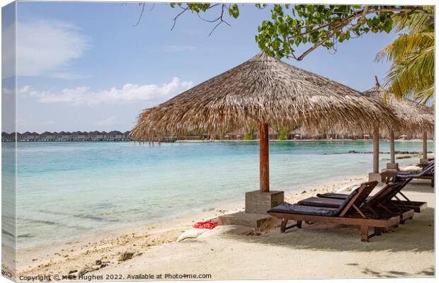 Beach life in the Maldives Canvas Print by Mike Hughes