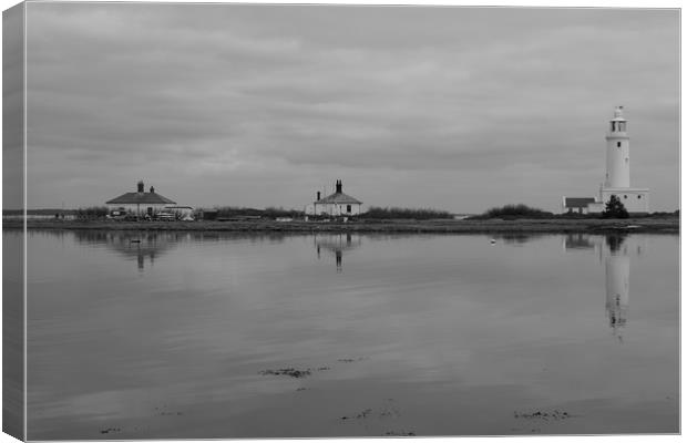 Hurst Point Lighthouse and Cottages in Spring Canvas Print by Rob Evans