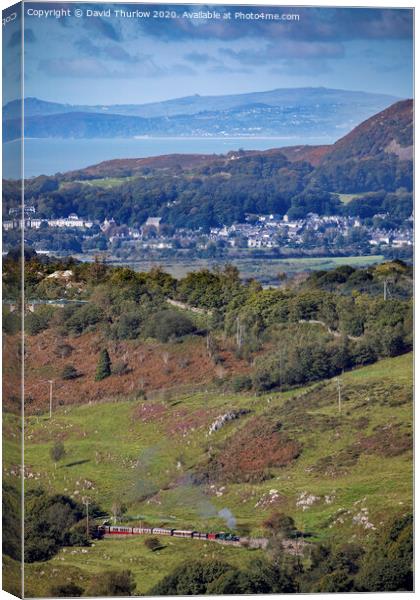 Ffestiniog Railway's Blanche locomotive brings a train through the Snowdonia landscape in north Wales Canvas Print by David Thurlow