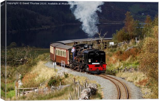 Welsh Highland Railway locomotive No87 winds its way to Rhyd Ddu. Canvas Print by David Thurlow