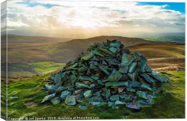 Cairn on Castle Knott Canvas Print by Jon Sparks