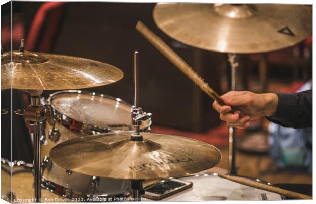 striking the drums and cymbals Canvas Print by Ben Delves