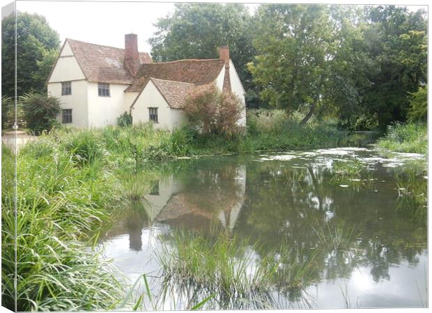 Serene Essex House by Reflective Lake Canvas Print by Simon Hill