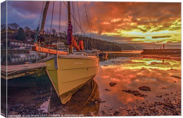Fiery Sunset over a Cornish Shrimper Canvas Print by Ian Stone