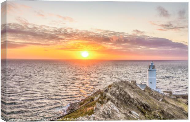 Start point lighthouse at sunrise Canvas Print by Ian Stone