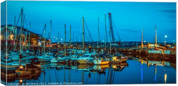 Torquay Harbour and Footbridge at night Canvas Print by Ian Stone