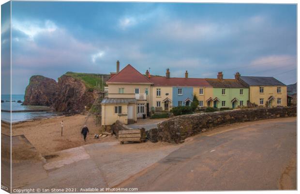 Fisherman’s cottages,Hope Cove. Canvas Print by Ian Stone