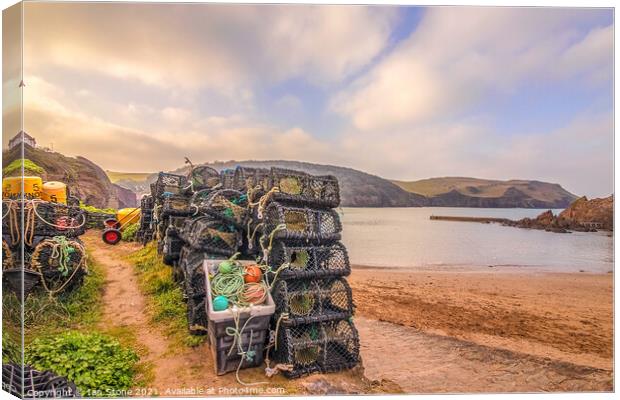 Hope Cove lobster pots  Canvas Print by Ian Stone