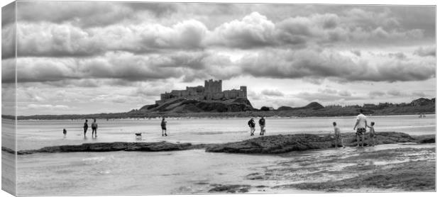 Storm clouds over Bamburgh Castle - Panororama Canvas Print by Philip Brown