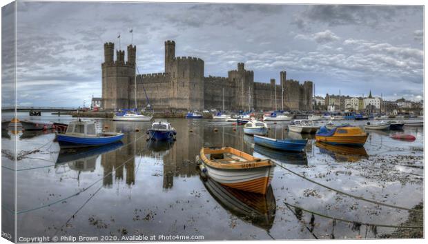 Caernarfon Castle and Harbour Canvas Print by Philip Brown
