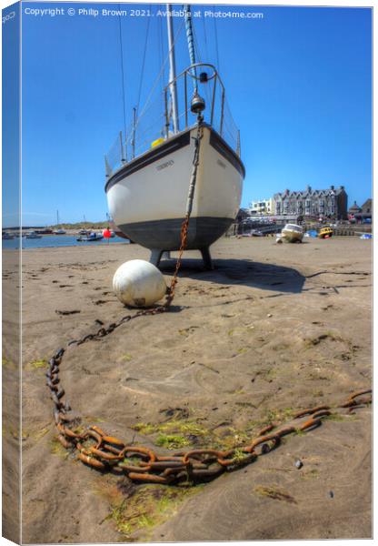 Boat on sandy beach at Barmouth Canvas Print by Philip Brown