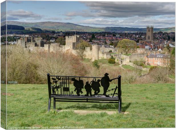 Overlooking The lovely town of Ludlow in Shropshire through a World war 1 monument bench - Landscape Canvas Print by Philip Brown