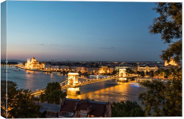 A view of Chains bridge at sunset in Budapest Canvas Print by Sergio Delle Vedove