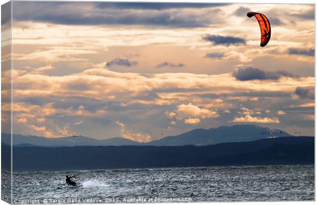 kitesurfing on the sea Canvas Print by Sergio Delle Vedove