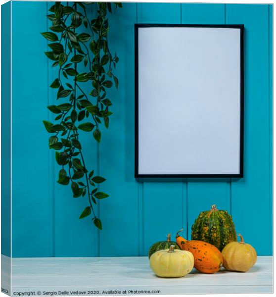 A blank black frame  and  some pumpkins Canvas Print by Sergio Delle Vedove