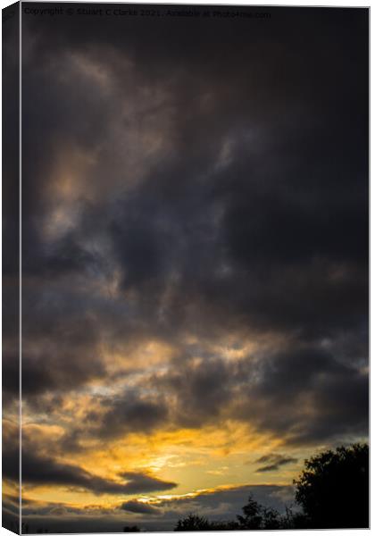 Stormy sunset Canvas Print by Stuart C Clarke