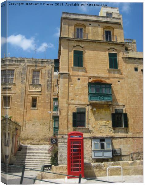Telephone box, Malta Canvas Print by Stuart C Clarke
