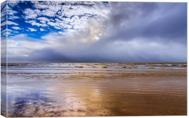 Winter beach reflections Canvas Print by Stuart C Clarke