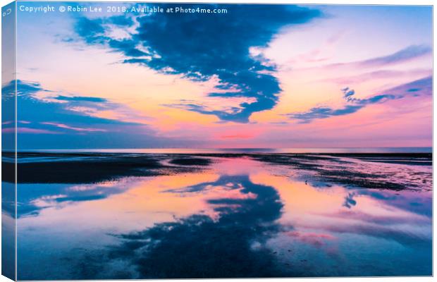 Sunset reflected on beach Canvas Print by Robin Lee